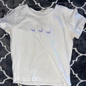 White butterfly cropped shirt.